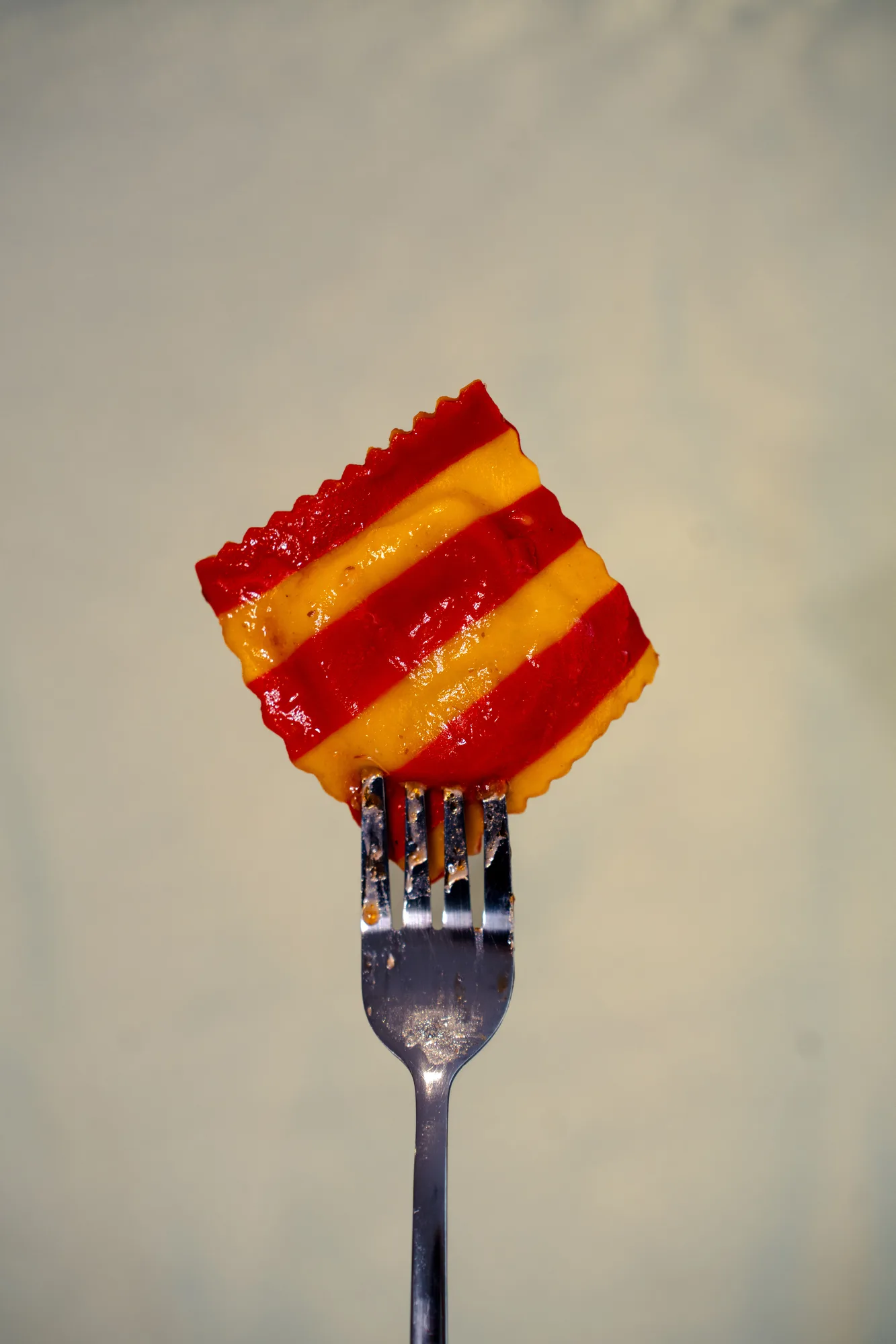 Close-up bite of lasagna