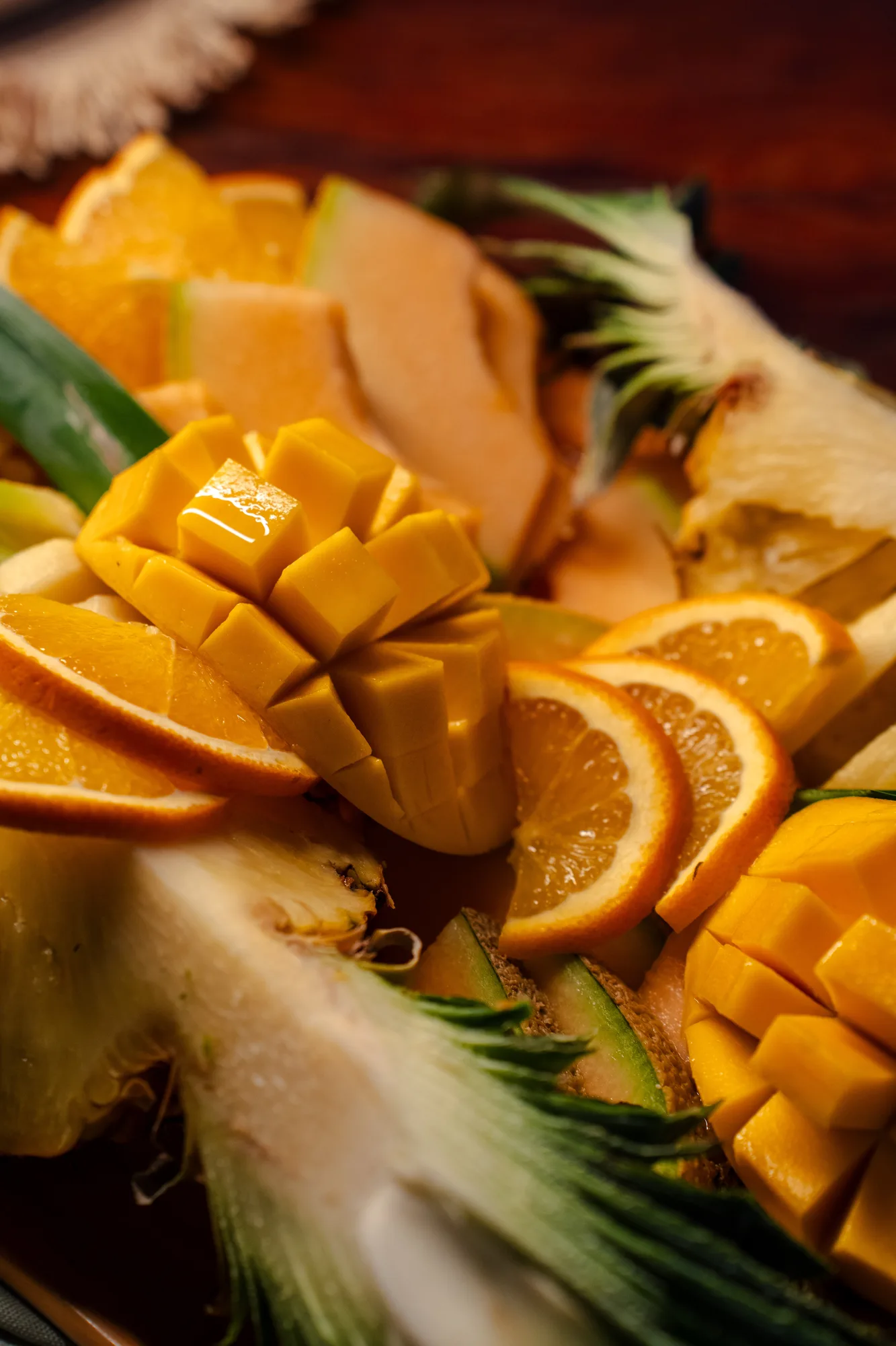 Macro shot of mango and orange slices